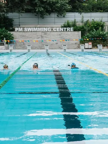A view of our main 50m pool, ready for action. We pride ourselves on maintaining a world-class facility with clean, clear water and clearly marked lanes, suitable for both recreational swimming and competitive training.