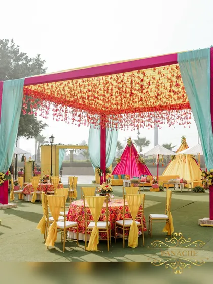 We believe in celebrations that are bursting with life and color. This poolside Haldi setup, with its vibrant canopies, traditional manji lounges, and phulkari details, shows how we infuse energy and joy into pre-wedding festivities.