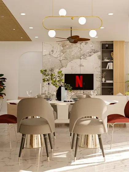 The dining area viewed from the front, showcasing a modern pendant light and a TV unit with a marble-finish backdrop.