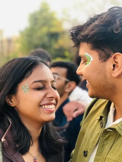Matching glitter designs for a couple. It's a fun way to coordinate your look at a festival or party.