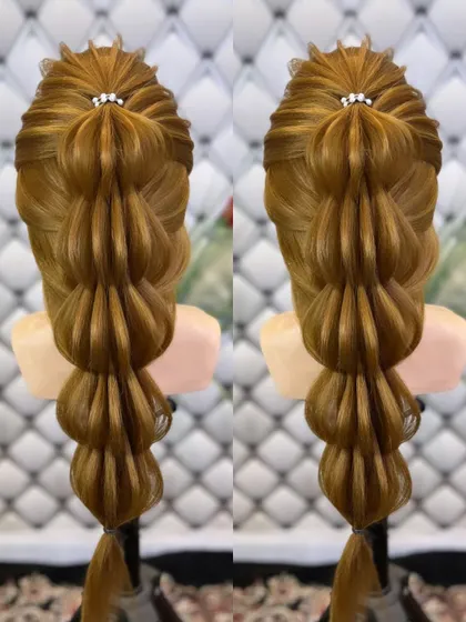 A beautiful open hairstyle with a bubble ponytail effect.