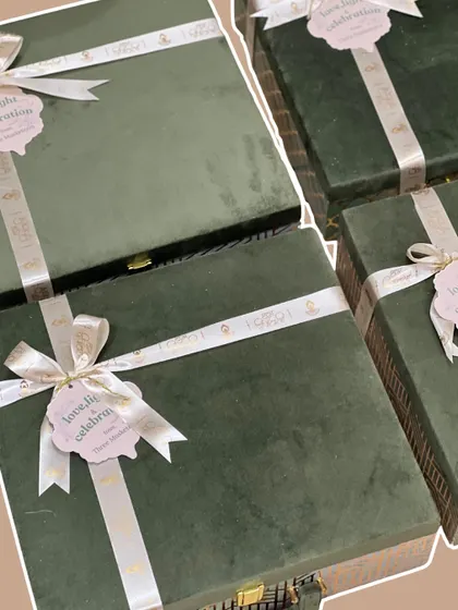 A bulk order of my green velvet Diwali hampers, all tied up with custom ribbons and ready to be dispatched. These make for impressive and elegant corporate gifts.