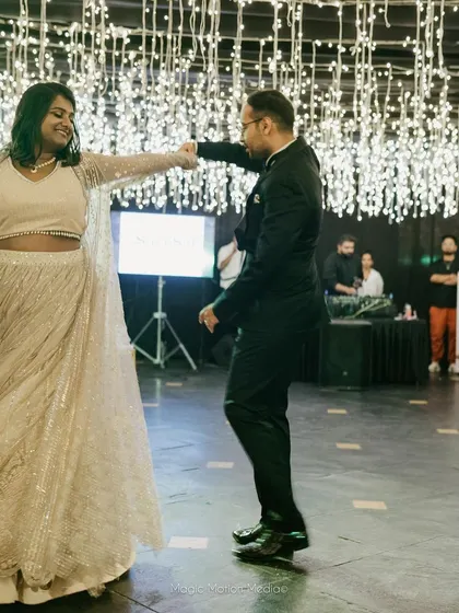 The couple shares their first dance at the reception, a beautiful and romantic moment on the dance floor.