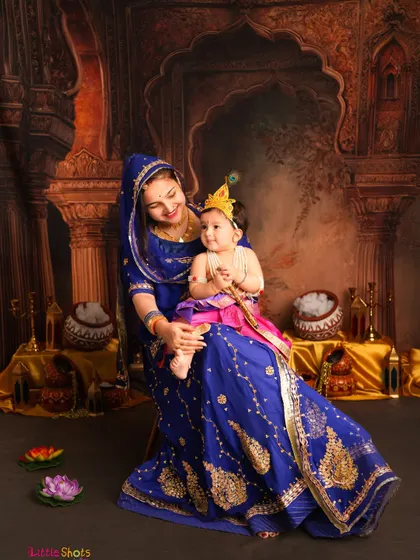 A tender moment between Yashoda and her little Krishna. The way she looks at him with so much love makes this Janmashtami photo incredibly special.