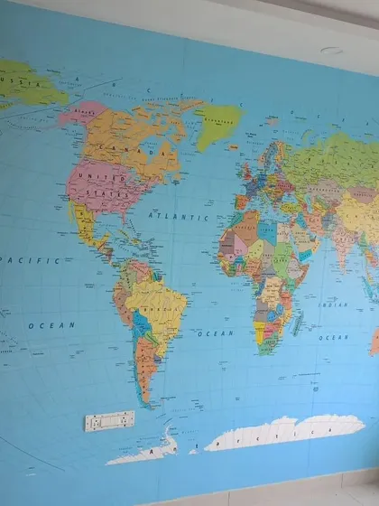 A classic political world map wallpaper, ideal for a study area.