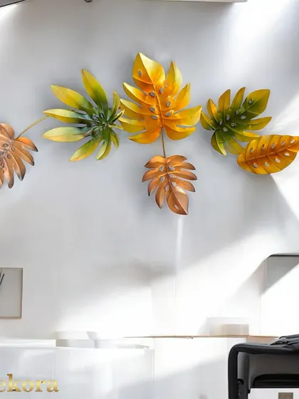 A spray of autumn-colored leaves in shades of orange, yellow, and green. This metal sculpture captures the feeling of a crisp autumn day.