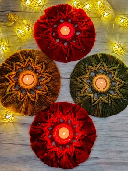 The deep red and mustard yellow candle holders create a traditional and warm festive look.
