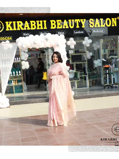 So proud to be standing in front of my new salon. I've poured my heart into creating a luxurious and welcoming space for all my clients.
