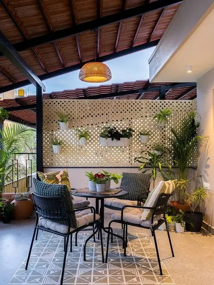 The Mathrukrupa terrace, featured for its thoughtful integration of greenery and outdoor living in a compact urban setting.