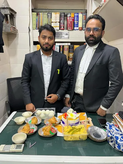 Another picture with my mentor, surrounded by celebratory food.