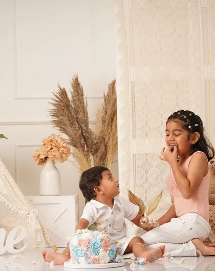 Another adorable shot from this sibling smash cake photoshoot.