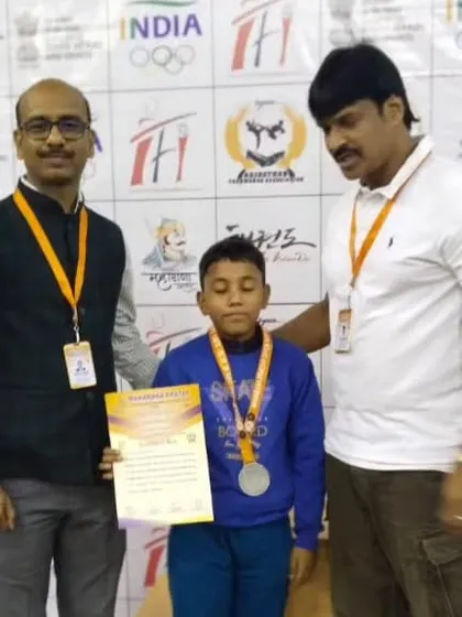 My student Rohan receiving his silver medal at the Maharana Pratap National Championship.