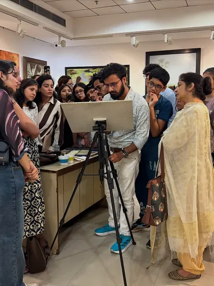 A wider view of the demonstration setup at Aifacs gallery, where participants could gather around to learn.