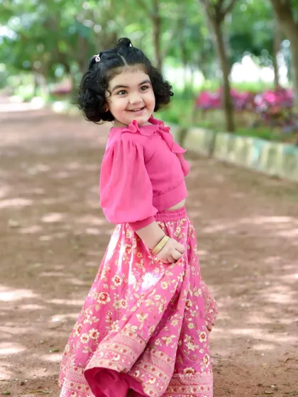 That carefree smile is what it's all about. Outdoor sessions allow kids to be themselves, resulting in natural and authentic portraits.