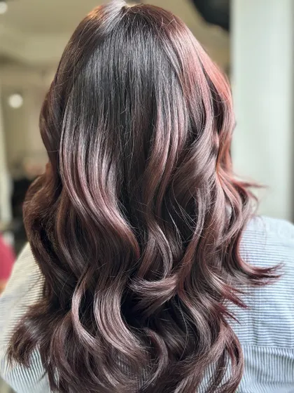 Your length, your look, one price. This client is rocking her beautiful reddish-brown waves.