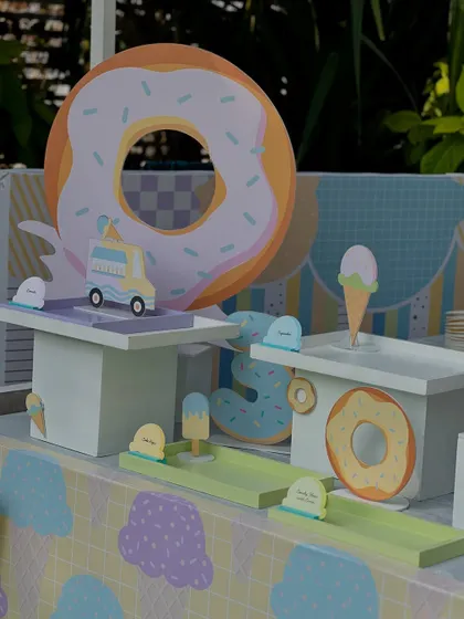 The dessert station featured miniature food trucks and other playful props to create a fun, interactive landscape.