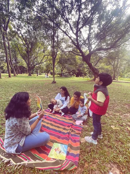 A series of photos from our 'Storyscapes 16' session, capturing the authentic, unposed moments of our circle. You can see children listening, playing, and interacting naturally, which is the essence of our child-led storytelling approach.