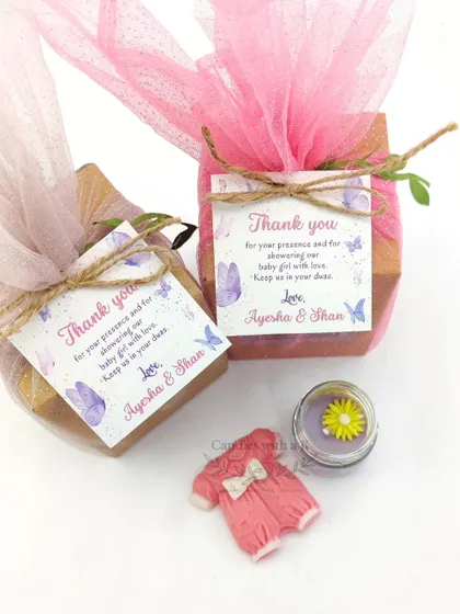Another example of a personalized baby announcement gift set, showing the custom thank you card with a butterfly theme.