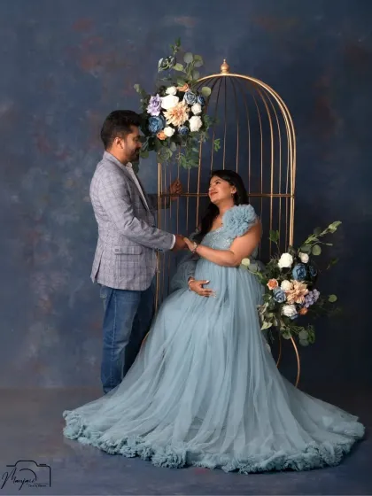 A moment of pure connection. The couple holds hands, their loving gaze telling a story of shared dreams and excitement for their new journey together.
