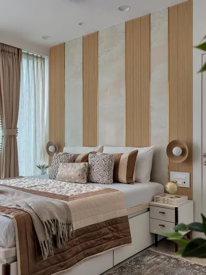This earth-toned bedroom is a beige dreamscape designed to soothe the soul. By layering different shades of brown and beige with varied textures, I created a contemporary space that feels like a warm, cozy retreat.