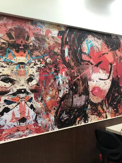 A duplicate of media 195, this image shows how a custom art mural can transform a standard office wall into a powerful statement piece.