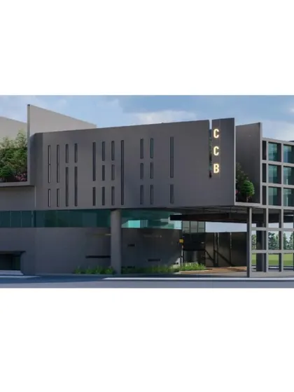 A daytime render of our contemporary design for a Public Office in Bangalore. The facade features striking geometric forms, recessed windows, and integrated planters that introduce greenery into the building's structure.