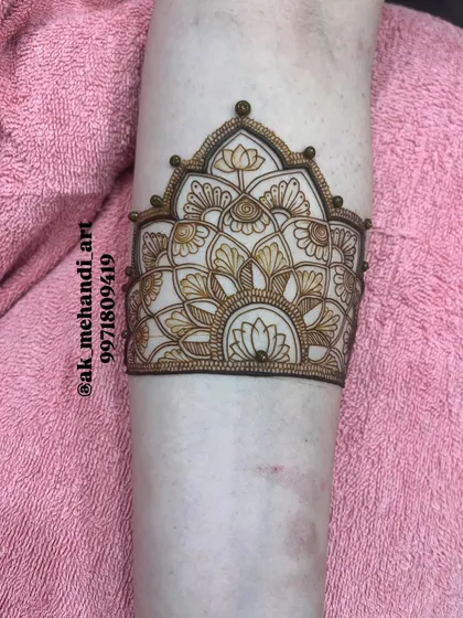 Another example of a beautiful lotus cuff outline. We practice these foundational shapes until they become second nature.