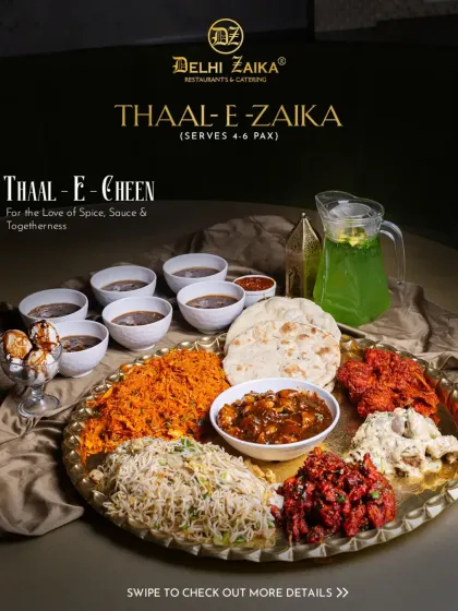 The full spread of our Thaal-E-Cheen, a celebration of spice, sauce, and togetherness. It's the best of both worlds, served on a grand platter.
