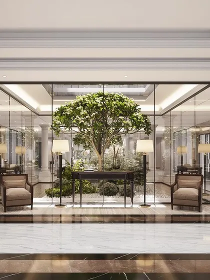 This neoclassical foyer is designed around a central courtyard, bringing a living tree into the heart of the home. The glass enclosure and classical columns frame the natural element, blending architecture with nature.