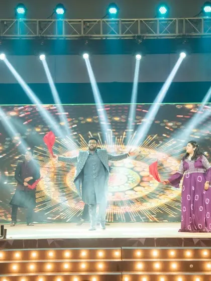 The groom takes center stage with his own choreographed performance, a highlight of the sangeet night. We help plan these special surprises.