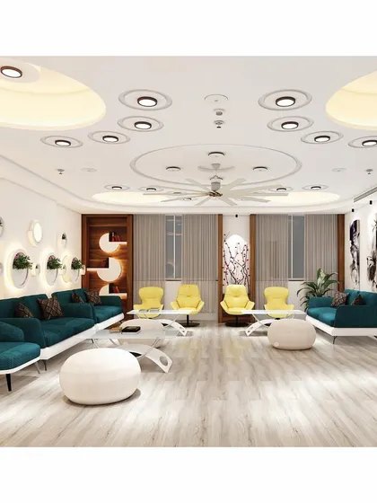 A full view of the lounge area, highlighting the symmetrical furniture arrangement and the circular design motifs on the ceiling and walls. This space serves as a comfortable and impressive area for guests.