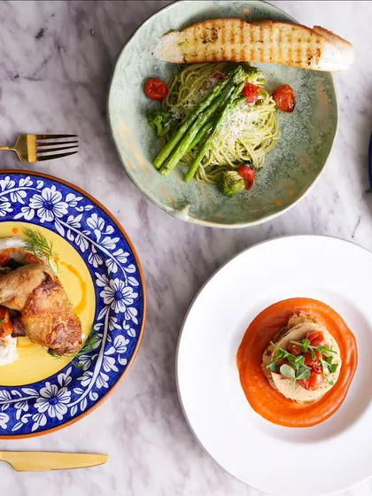 A beautiful spread featuring my signature Duck Confit and a stacked potato gratin. Each dish is its own little love affair.
