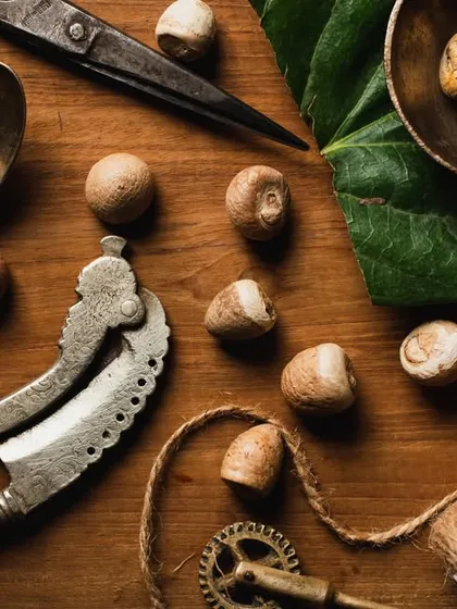 A great photo is all about the details. This flat lay features betel nuts alongside vintage props like an old 'adkitta' and scissors that I sourced from Pune's Juna Bazaar. Creating a unique mood through careful prop styling is a huge part of my process for both food and product shoots.