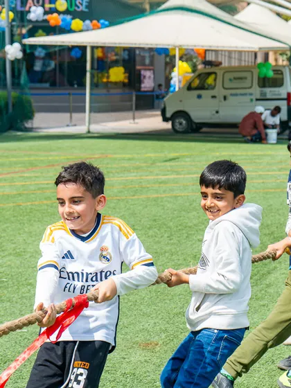 A fun game of tug-of-war during a football-themed party. I organize a variety of games to keep all the kids engaged and entertained throughout the event.