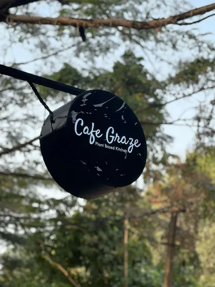 The Cafe Graze sign, a beacon for those seeking healthy, plant-based food.