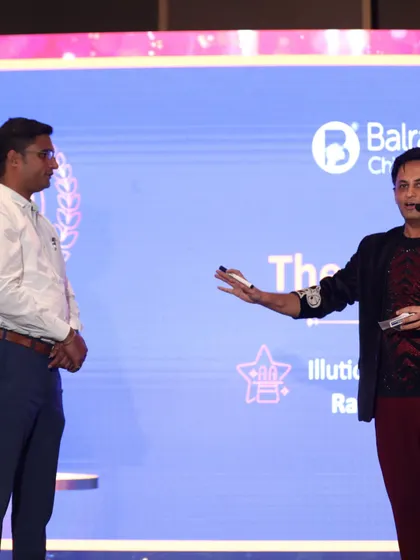 Interacting with a volunteer on stage at the Balrampur Chini Mills awards. Bringing audience members into the act is key to my interactive mentalism performance.