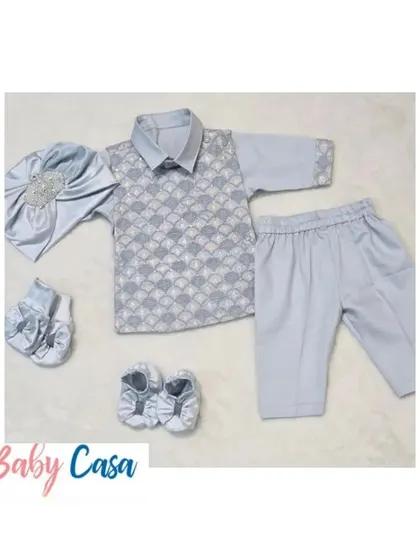 A handsome ethnic wear set for a little boy. This light blue kurta with a printed brocade jacket and matching shoes is perfect for any festive occasion.