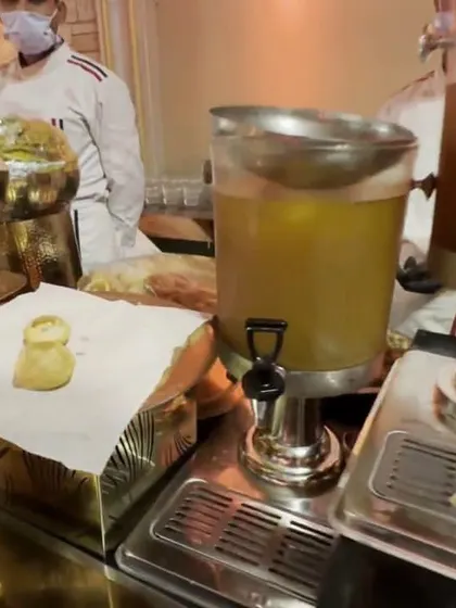 A glimpse of my live beverage station, featuring fresh juice dispensers and a setup for golgappe, a classic pairing that guests always enjoy.