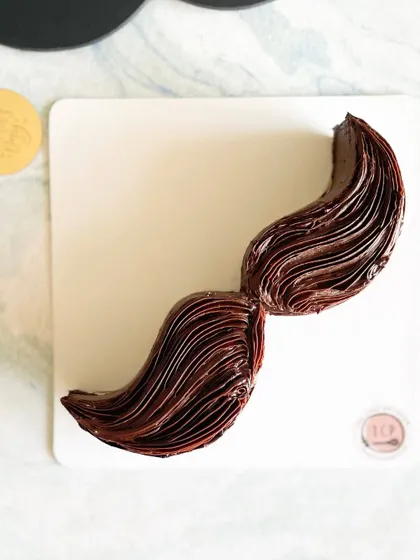 For the classic dad, a quirky mustache-shaped chocolate cake from my Father's Day Edit. It's a fun treat to make him smile.
