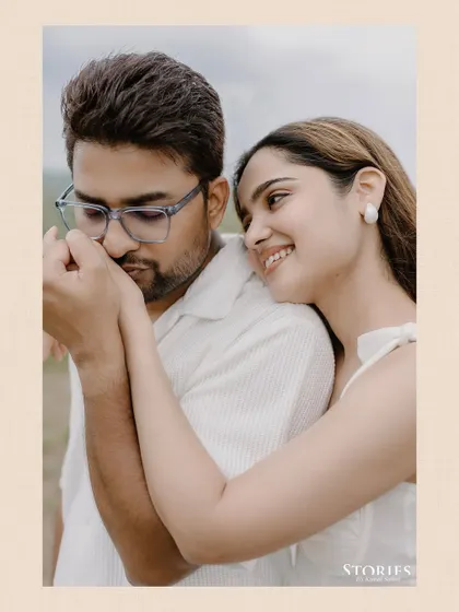 An intimate portrait focusing on the gentle touch and loving expression between the couple during their Udaipur shoot.