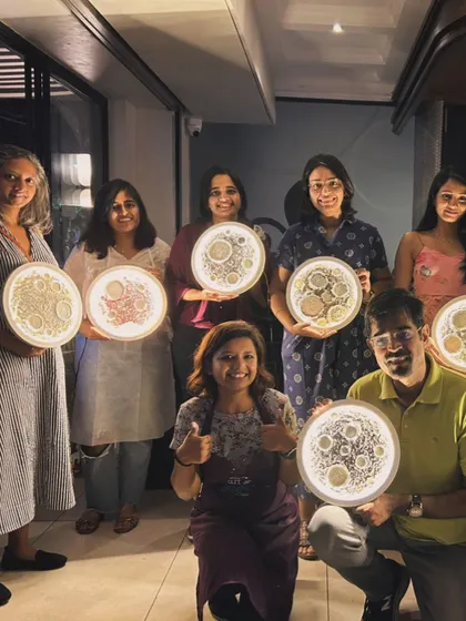 A group shot from our moon lamp workshop. Everyone is so happy with their creations, and the lamps look amazing all lit up together.