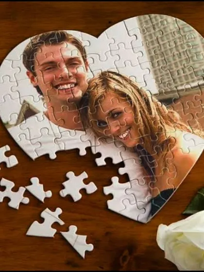 For a romantic gift, I can create a heart-shaped jigsaw puzzle from your favorite couple's photo. This 80-piece puzzle is a sweet and memorable keepsake.