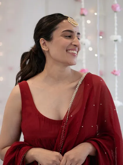 A candid shot of the Alia-inspired look. It's a testament to how a simple ponytail can be elevated to a stunning bridal or festive style.