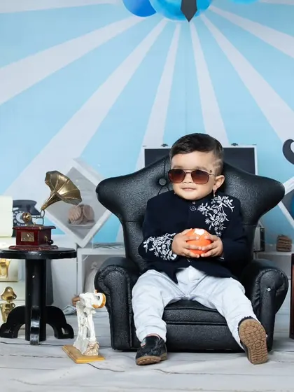 This little guy is looking cool and relaxed in his sunglasses, like a true boss.