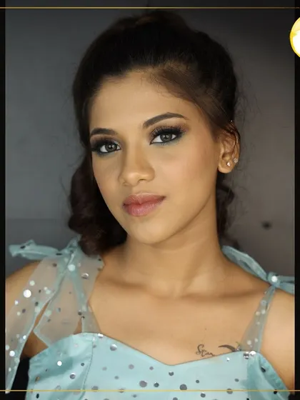 This is the complete party-ready look, featuring a stylish updo and glowing skin. My courses cover how to ensure makeup looks flawless from every angle.