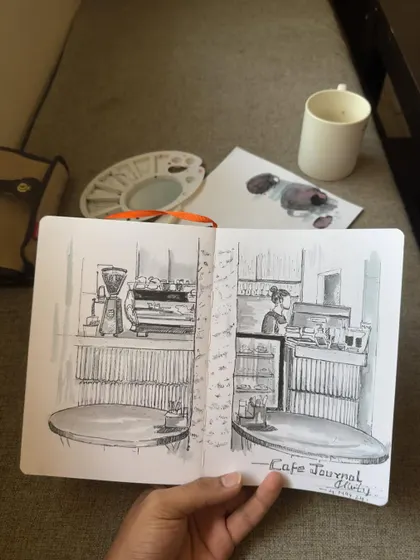 The full spread of my Cafe Journal sketch. I love filling my sketchbook with memories of places I've been.