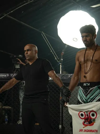 A close-up of the pre-fight face-off. The intensity in their eyes tells the whole story. This is the calm before the storm.