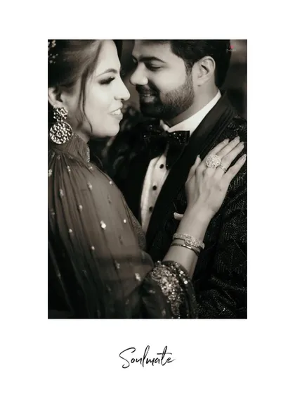 A classic black and white portrait titled 'Soulmate', capturing the deep and loving connection between the couple on their engagement day.