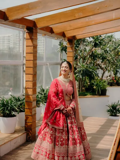 The same bride, now breaking into a joyful, radiant smile, ready for her big day.