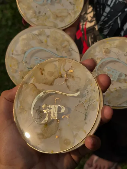 Another set of personalized coasters made from preserved wedding flowers. These small keepsakes are a wonderful way to share the memory of your special day with loved ones.